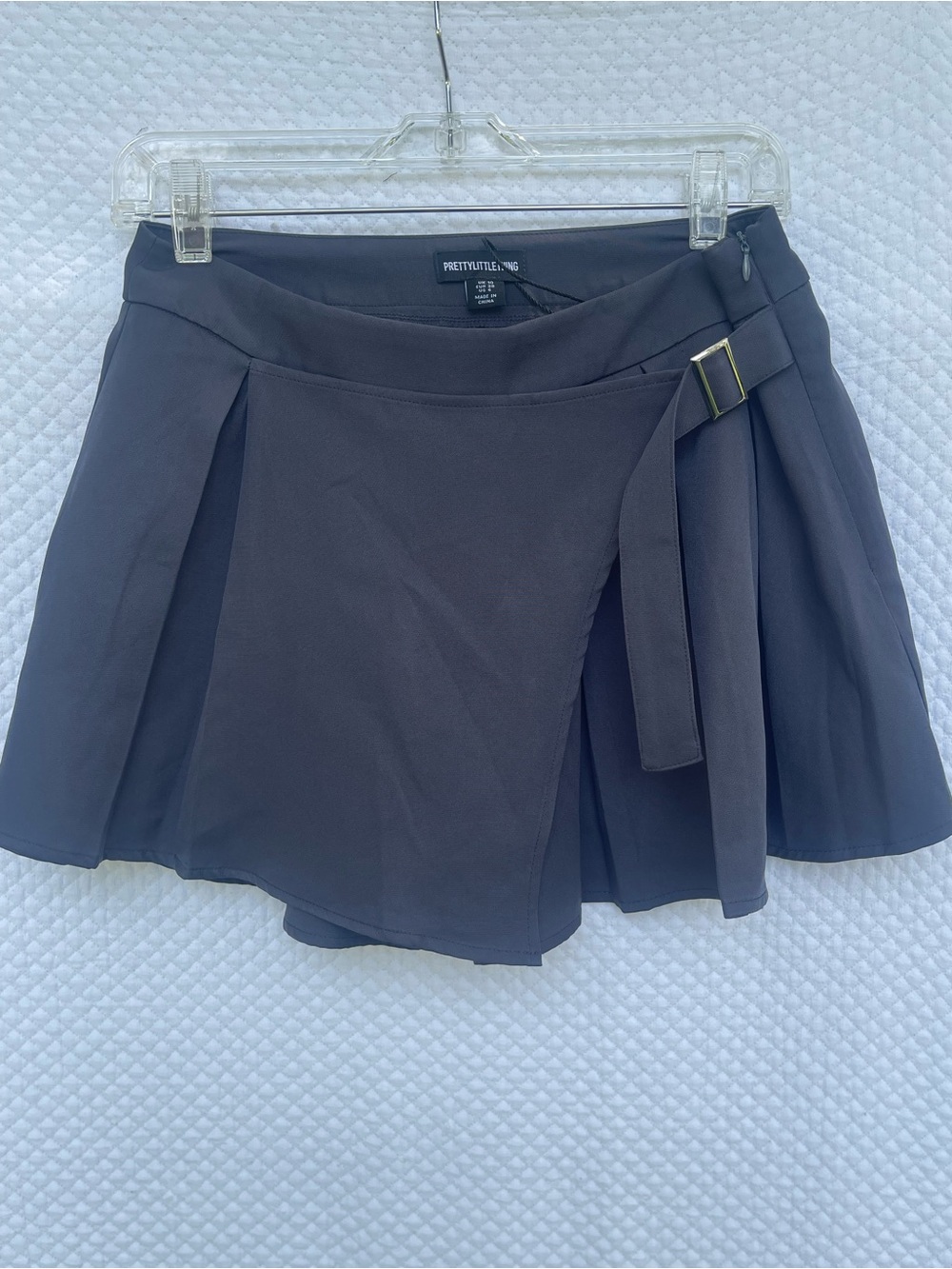 PrettyLittleThing Black Wrap Pleated Skirt with Buckle Detail